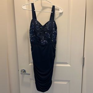 Short size 7 never worn midnight blue dress with sequins